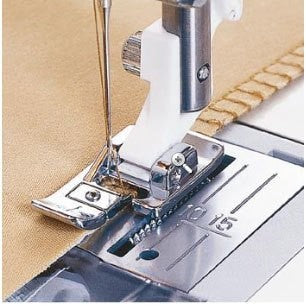 Prensatelas Husqvarna Sobrehilado